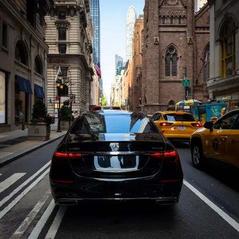 S-Class gliding through Lower Manhattan