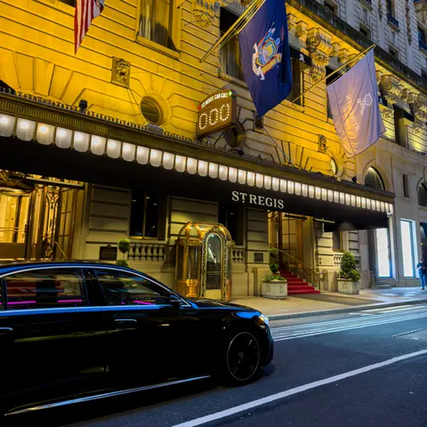 Evening curbside arrival in Midtown Manhattan