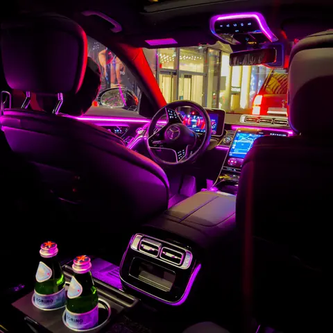 Ambient-lit S-Class cabin with chilled mineral water